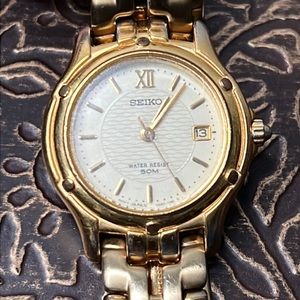 SEIKO gold-toned watch Water Resistance 50 M